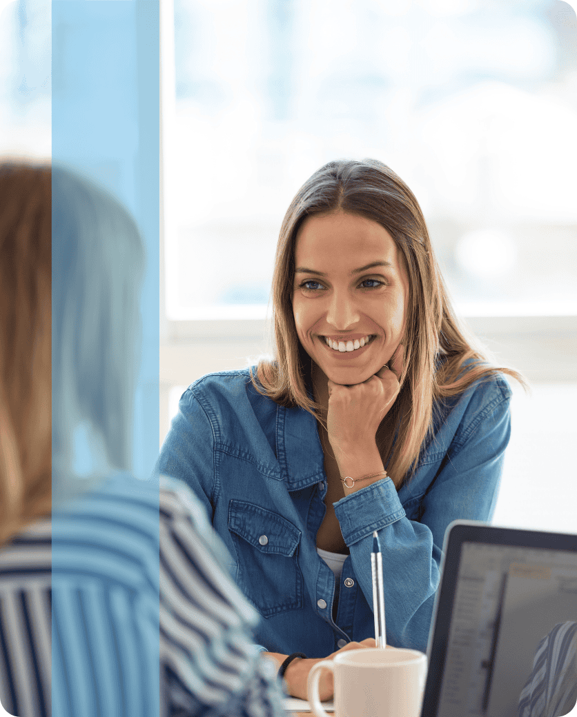 Two professionals in an interview meeting, representing Konnekt's teams.