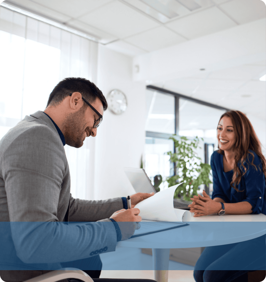 A recruiter interacting with a colleague representing the Konnekt Skilled & Operational recruitment team.