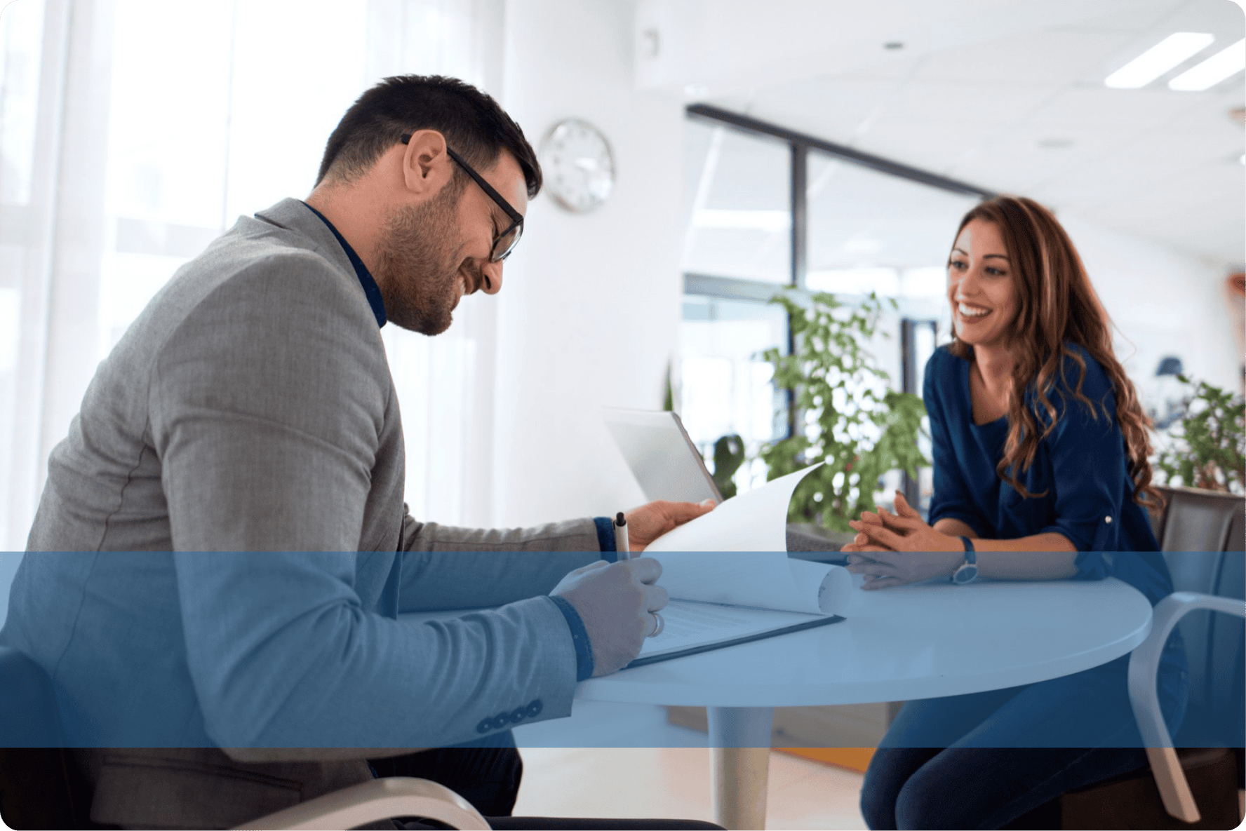 A recruiter interacting with a colleague representing the Konnekt Skilled & Operational recruitment team.
